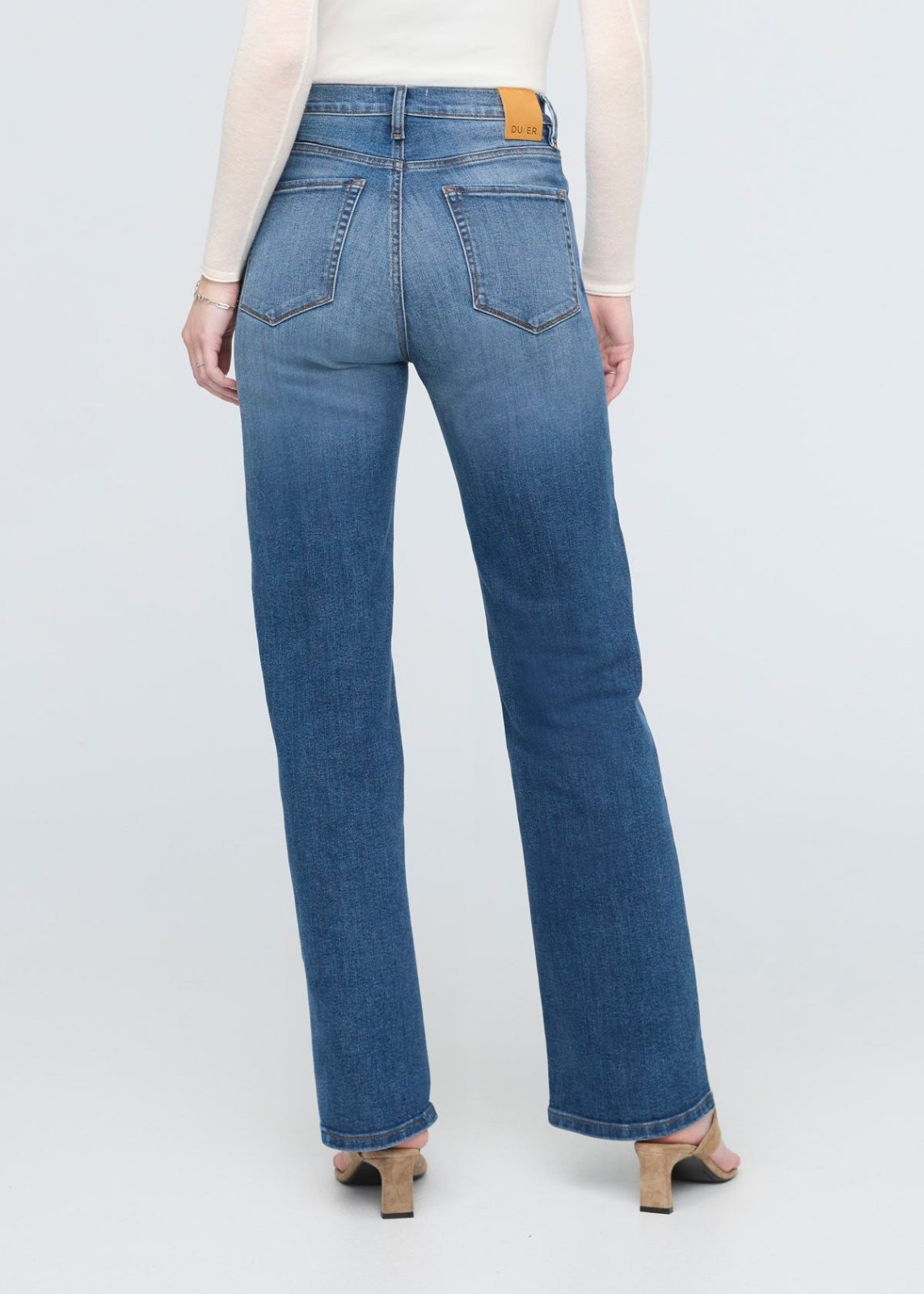 women's mid blue high rise straight jeans back