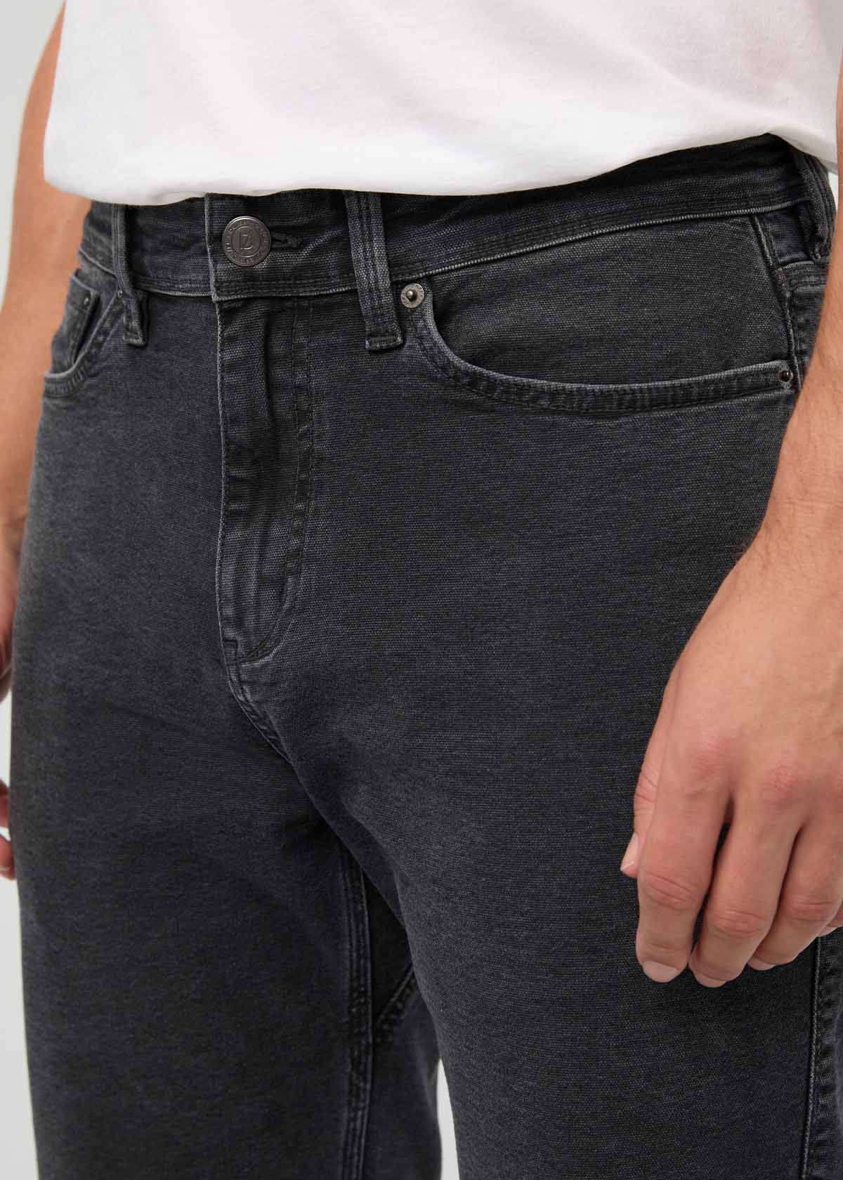 pantalon-homme-en-toile-extensible-coupe-ample-effilée-noir - détail de la poche avant