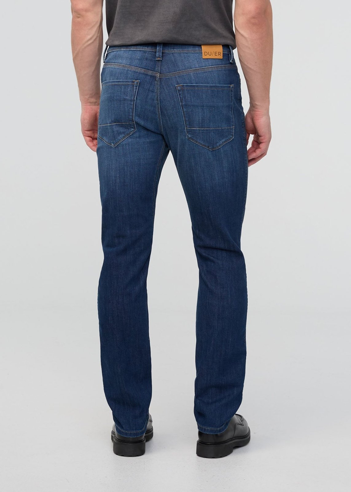 mens performance denim slim straight ocean swell back