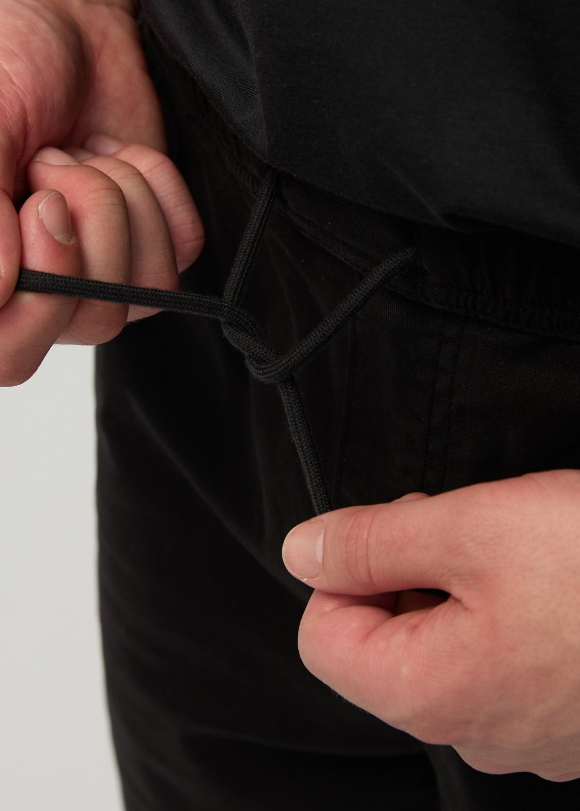 Men’s Black Stretch Travel Shorts front string waistband detail