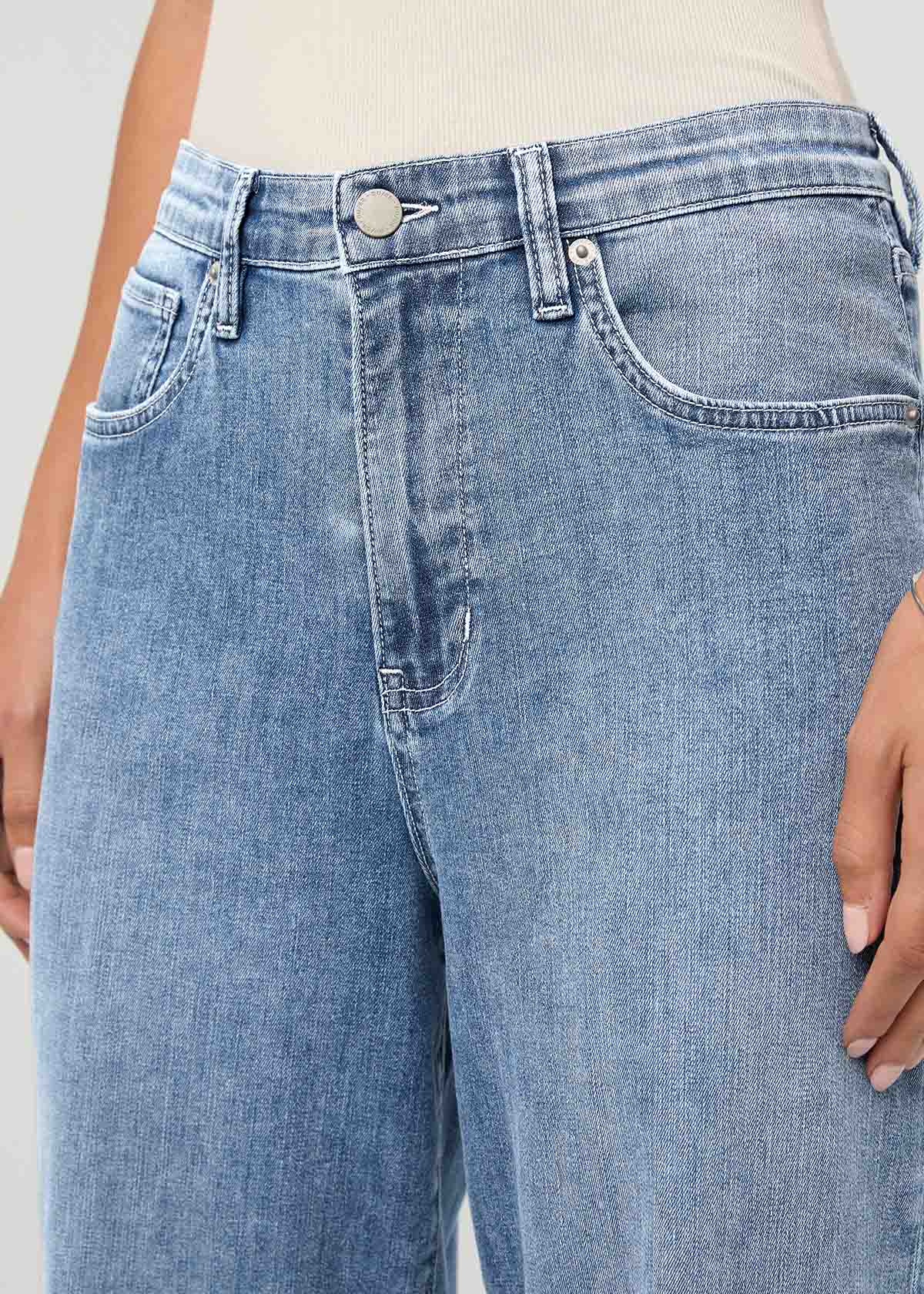 Light stone wash high-rise straight denim jeans with five-pocket styling and button fly closure.