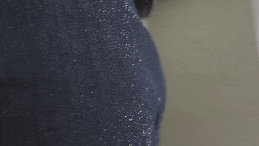 water beading off water-repellent jeans